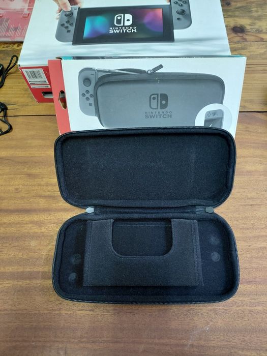 Nintendo Switch V1 Completa (Como Nova) + Super Mario 3D All-Stars + Super Mario Odyssey + Bolsa Oficial