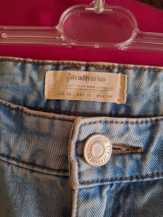 Modne spodnie jeansy z dziurami boyfriend stradivarius xs 34