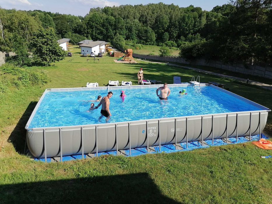 Domek z sauną i banią lub jacuzzi, basen,  nad jeziorem Klimatyzacja