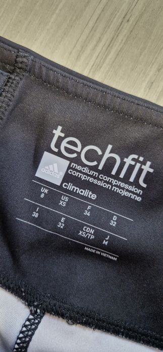 Adidas getry legginsy sportowe treningowe techfit Ais Capri Illum XS