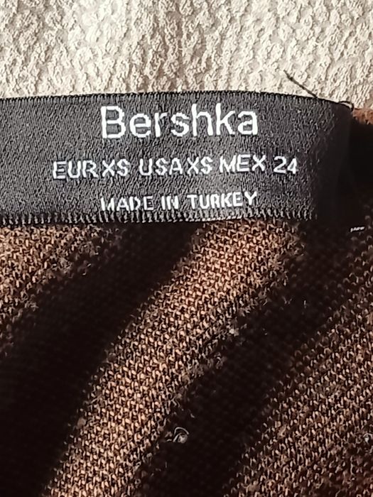 Calça macacão listado da Bershka