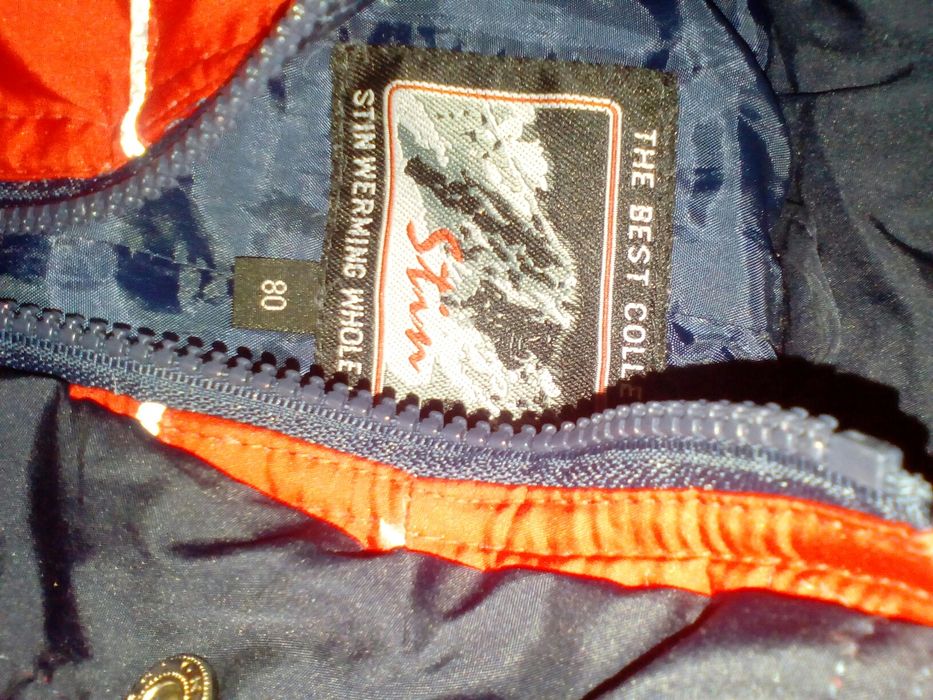 Продам зимний комбезик-пуховичок на дев.3-4 годика