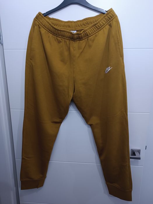 Oryginalne spodnie dresowe musztardowe Nike XL