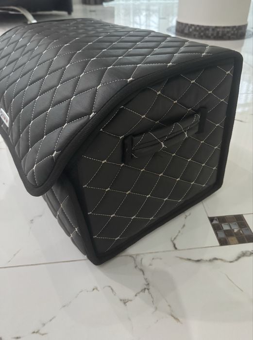 Аксесуары в багажник автомобиля