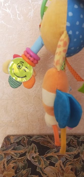 Игрушка в коляску,музыкальная игрушка
