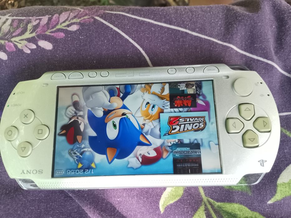 psp 1000 срiбного кольору