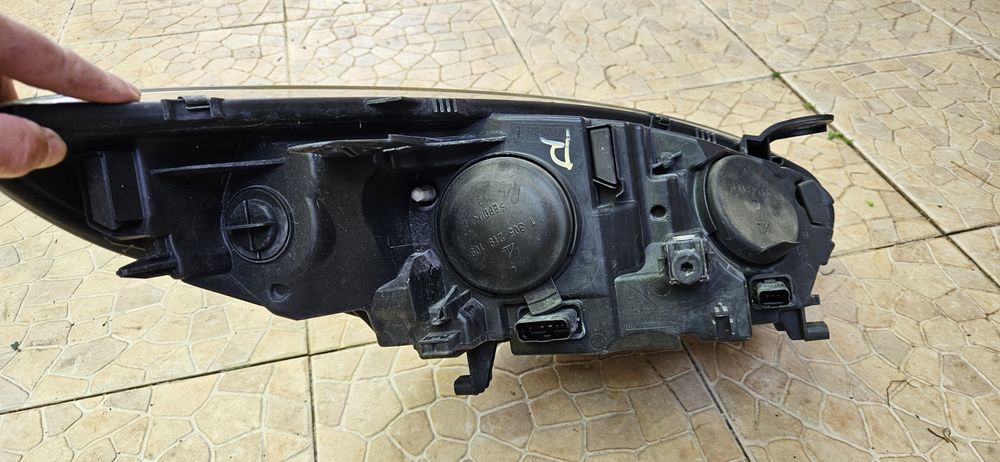 Farol Megane III GT Line frente esquerdo
