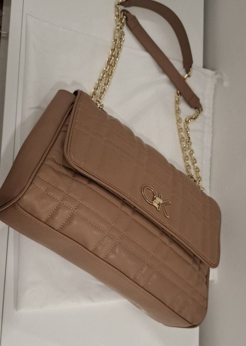 Mala +Carteira  Calvin Klein originais e novaa