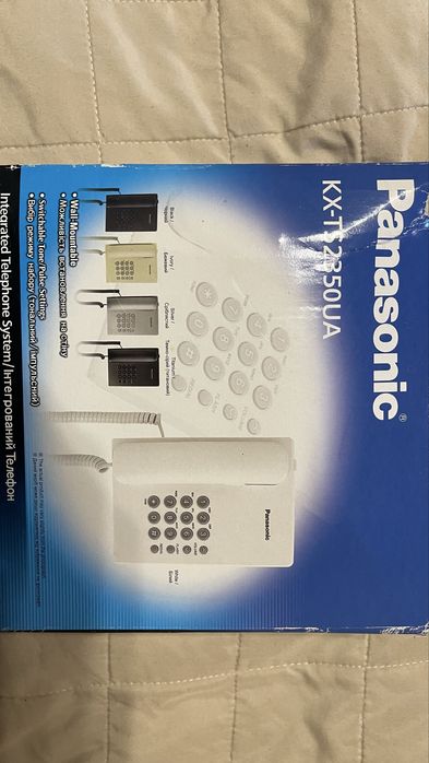 Телефон  стационарного  Panasonic в состоянии нового