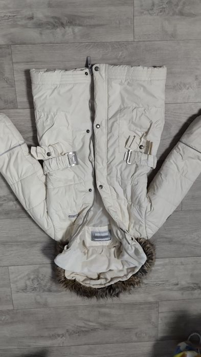 Теплі куртки для дівчини