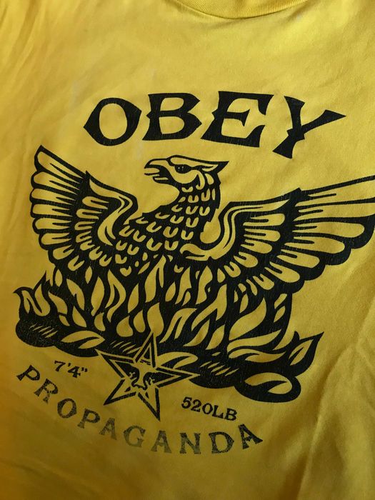 T-shirt OBEY Vintage Águia Amarela Propaganda L Shepard Fairey Eagle