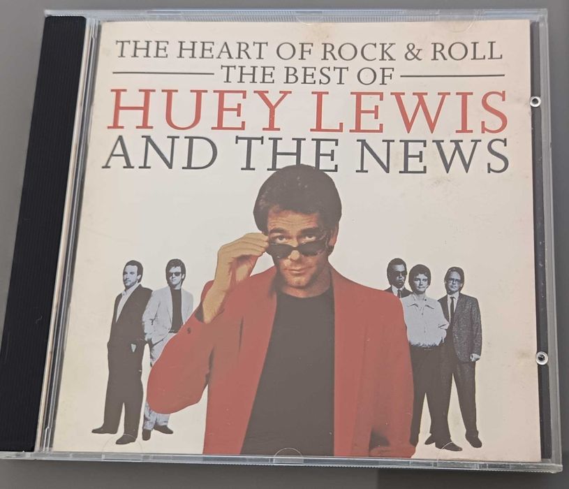 CD "The BEST OF Huey Lewis and the news", em ótimo estado, como novo.  Contém 17 Músicas ( ver foto 2 )