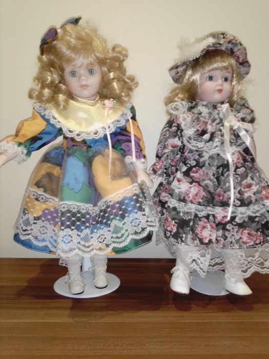Bonecas de porcelana estão novas  como se vê nas fotos