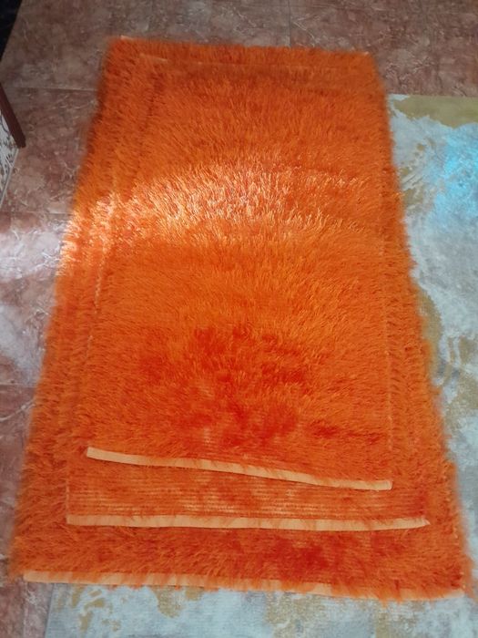 Coberta casal e tapetes