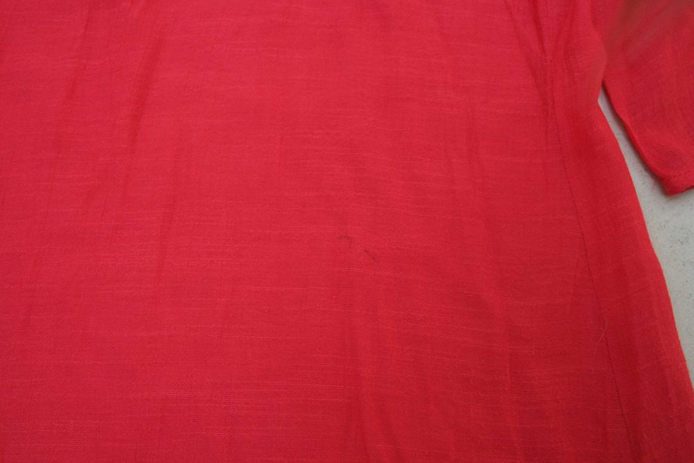 Túnica com aplicações nos ombros