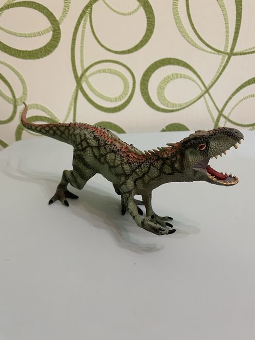 Динозавр іграшка