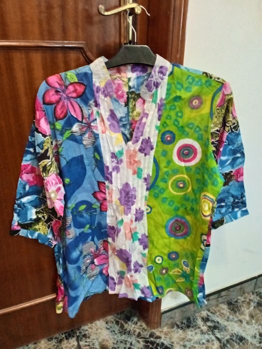 Roupa TAM XL em bom estado