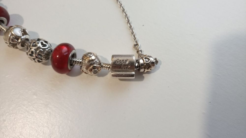 Pulseira e contas Pandora Ouro