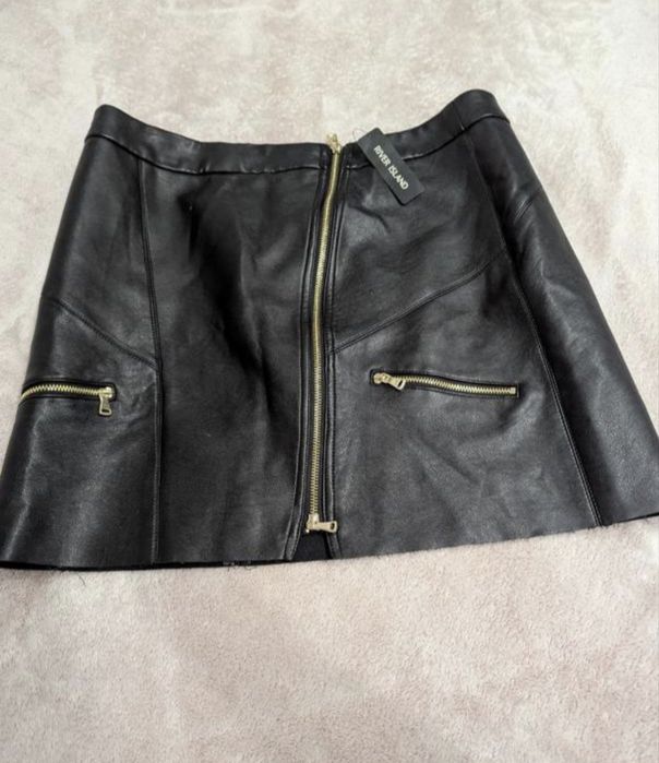 Юбка эко кожа,черная,новая, размер  L.