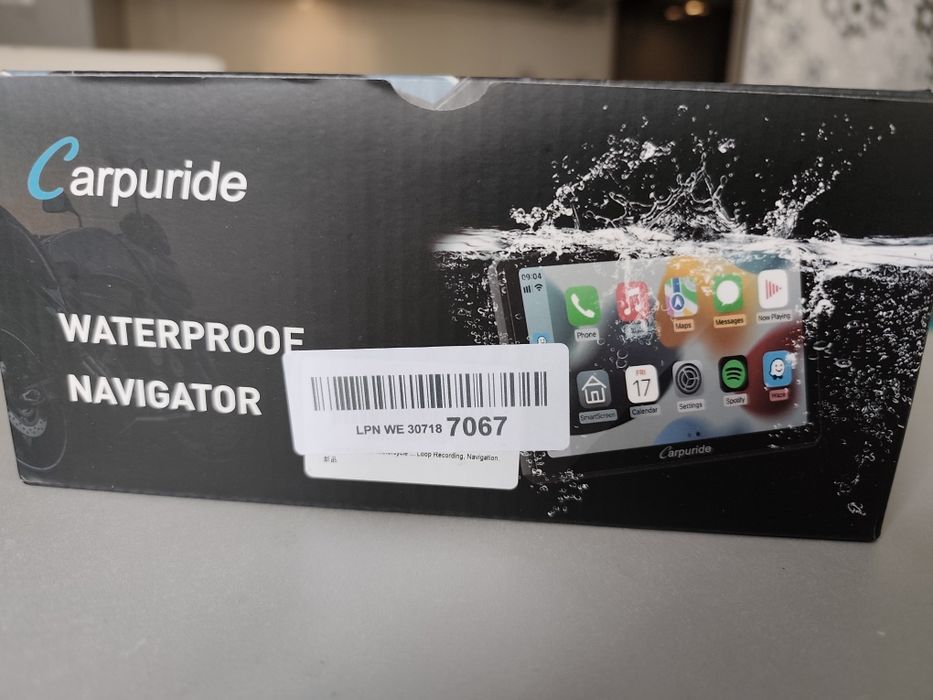 Carpuride W712D to 7-calowy, wodoodporny system multimedialny do moto