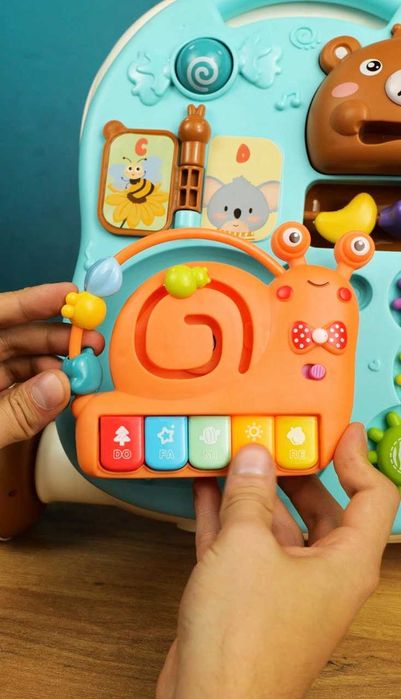 Ходунки-каталка та інтерактивний розвиваючий столик-бізіборд 3 в 1