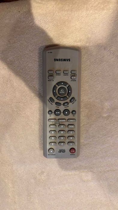 leitor de dvd da marca Samsung com comando