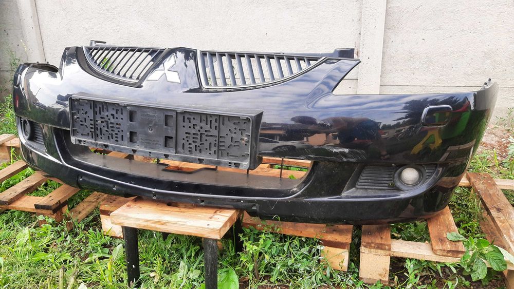 Mitsubishi Lancer VII 7 zderzak przedni kompletny spryski halogeny