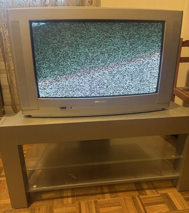 Televisao top, imagem é boa conjunto com movel