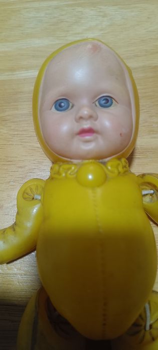 Antigo boneco plástico