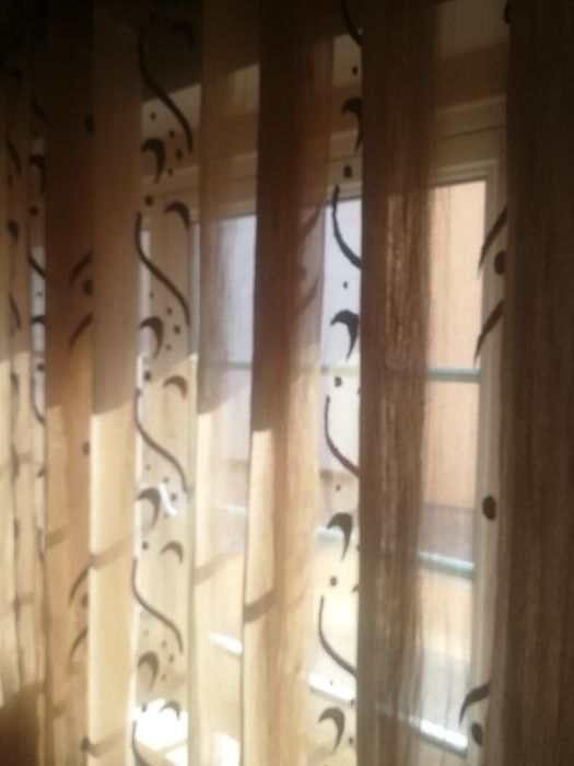 Conjunto de cortinados com argolas