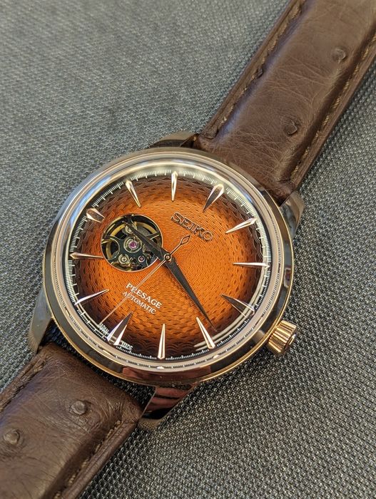 Prestiżowy Seiko mod open heart różowe złoto brązowy pasek