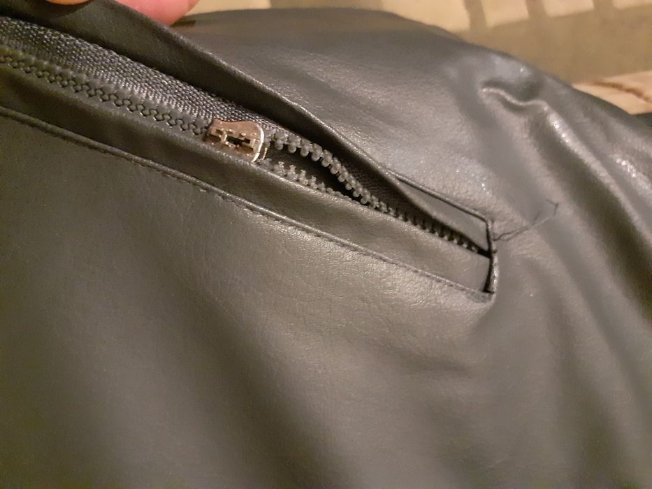 Dwustronna ocieplana damska kamizelka z kapturem