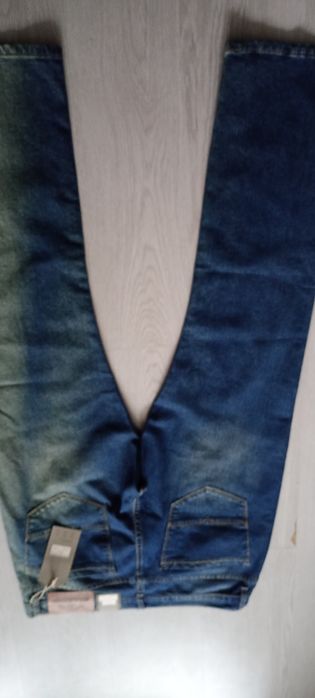 Nowe spodnie jeansy męskie