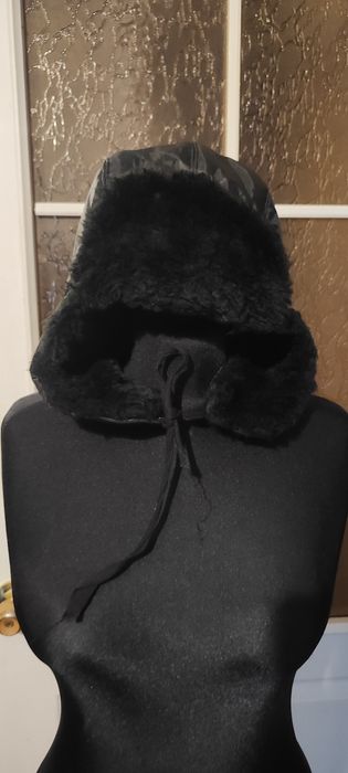 Теплі шапки-вушанки на зиму.