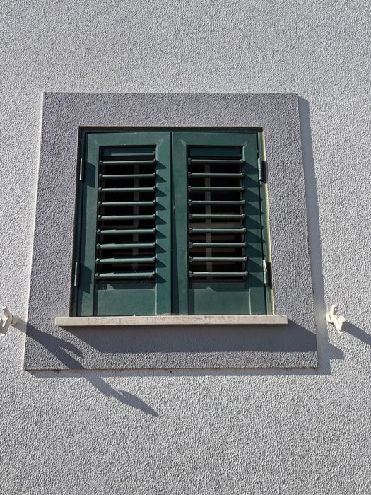 Portadas de aluninio verde usadas