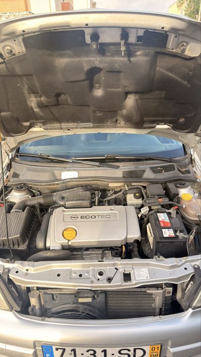 Opel 4 portas 165 mil km motor impecavel 2mil foto 5