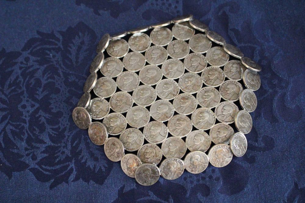 Despeja bolsos feito com antigos centavos brasileiras