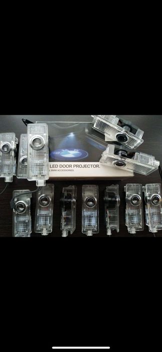 Подсветка дверей с логотипом БМВ