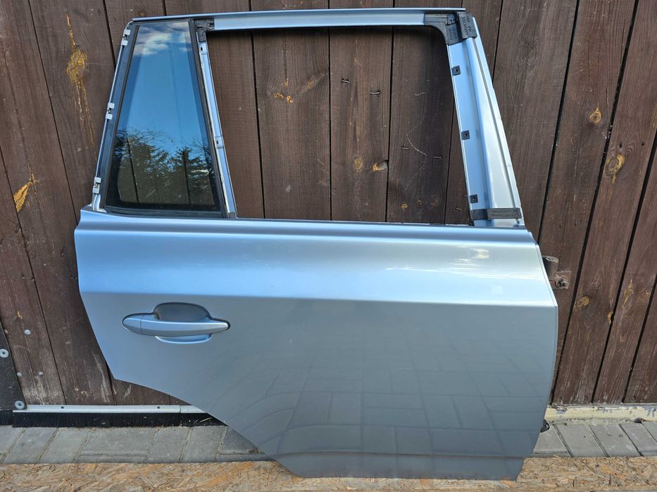 BMW X3 E83 Drzwi Prawe Tył BLUEWATER 896/5