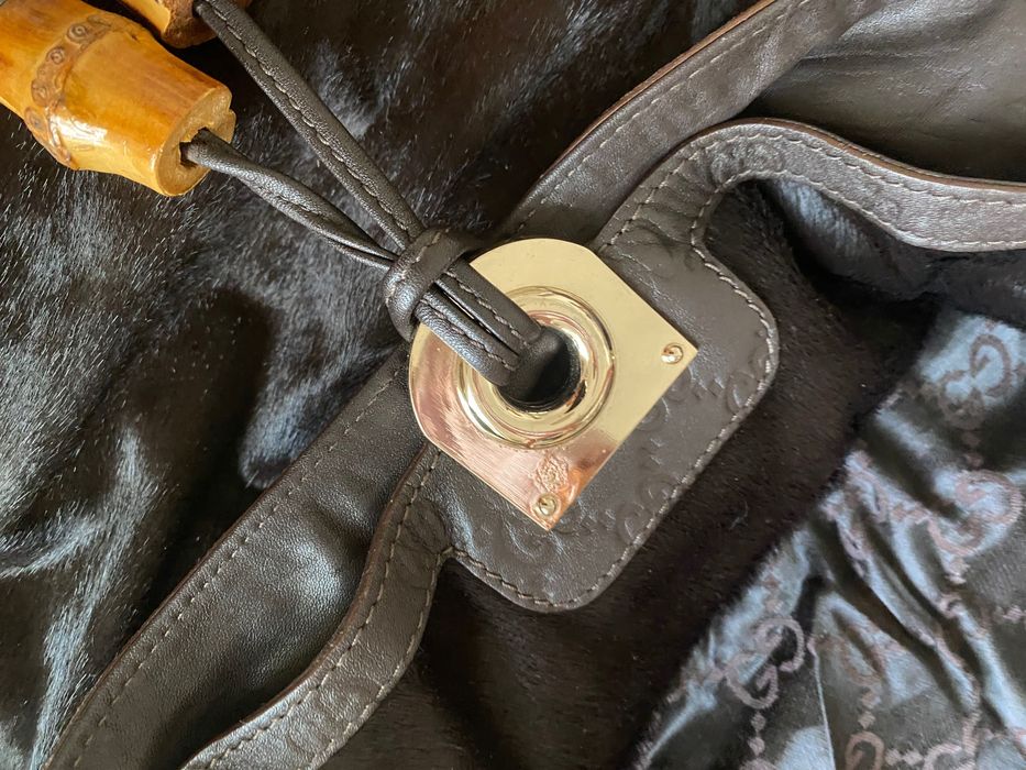 Bolsa/Carteira Gucci em pele poney cor castanho oscuro