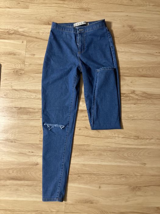 Jeansy z dziurami Denim Co