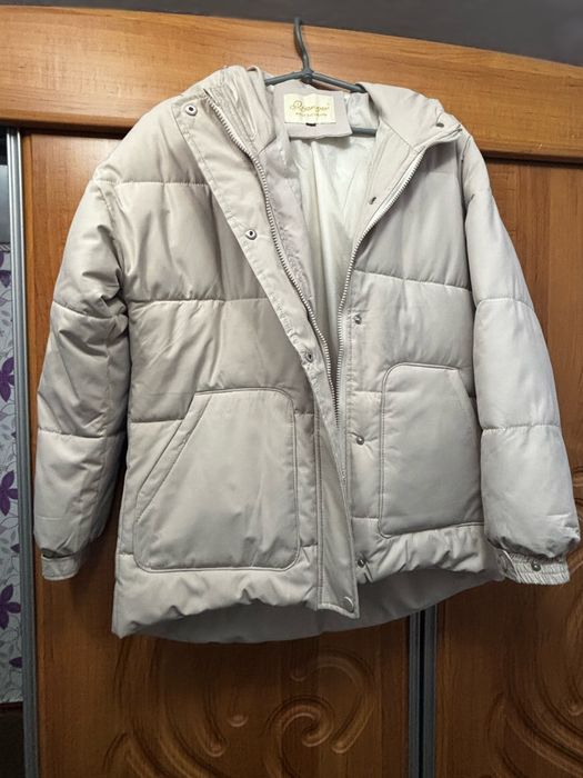 Зимова куртка бежевого кольору