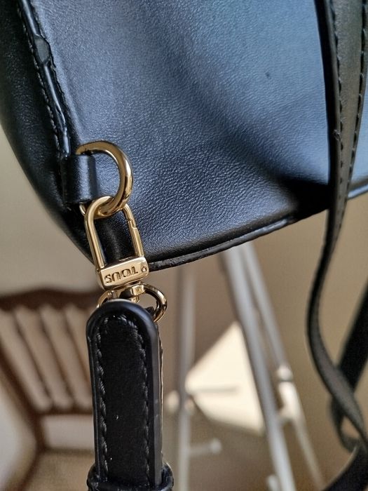 Mochila preta da tous  tenho certificado de autenticidade