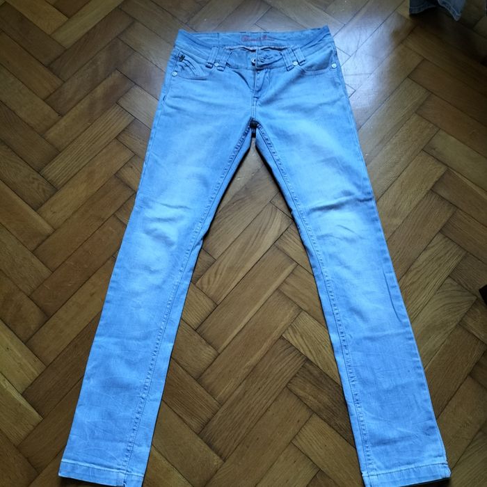 DIESEL spodnie damskie jeansy slim 
DIESEL Roxanne