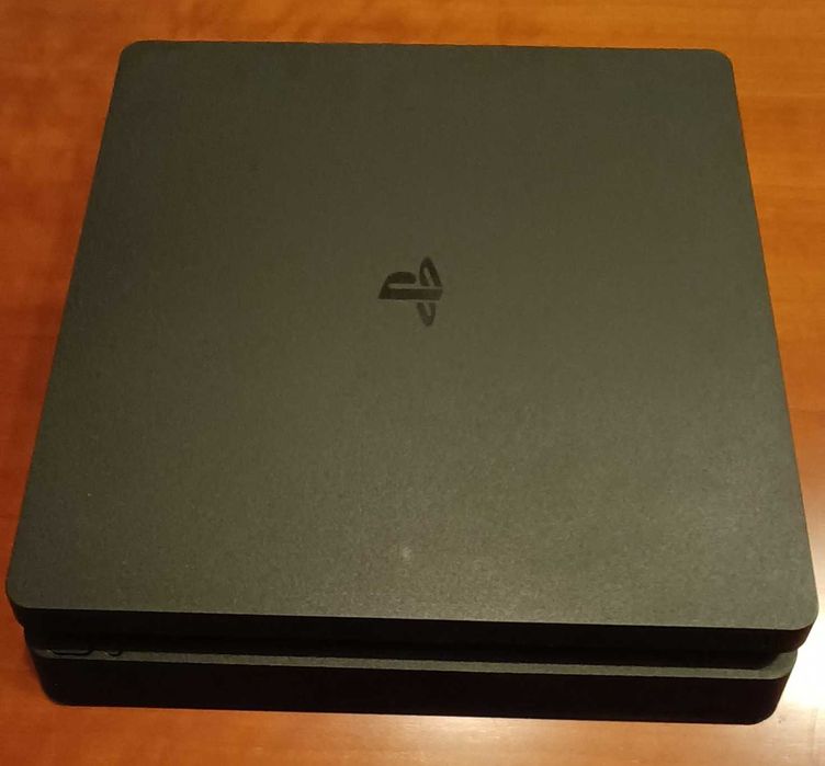 PlayStation 4 (PS4) Console with 2 Controllers, Charger, and 4 Games64309592920194120