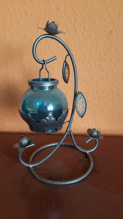 Metalowy świecznik kwiatki/liście