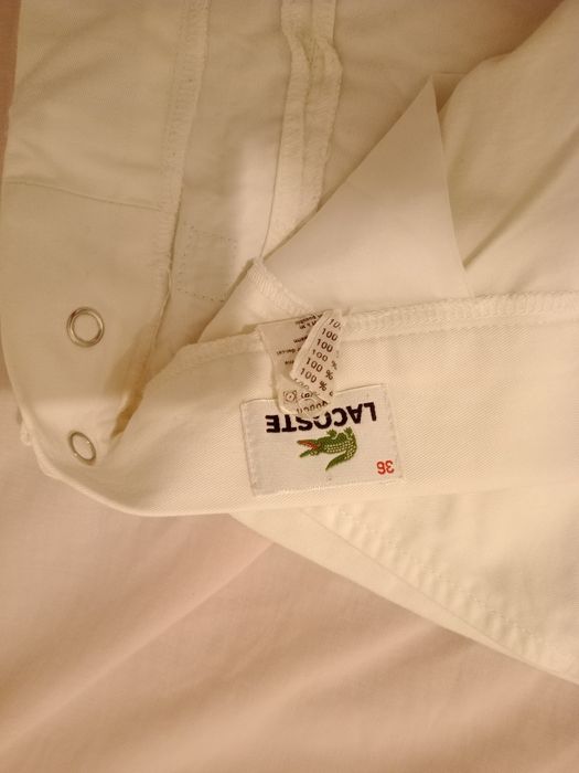 calções branco da Lacoste
