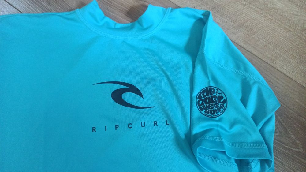 Koszulka do sportów wodnych firmy RIP Curl. Damska