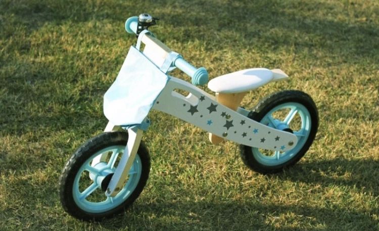 Nowy drewniany rowerek biegowy niebieski