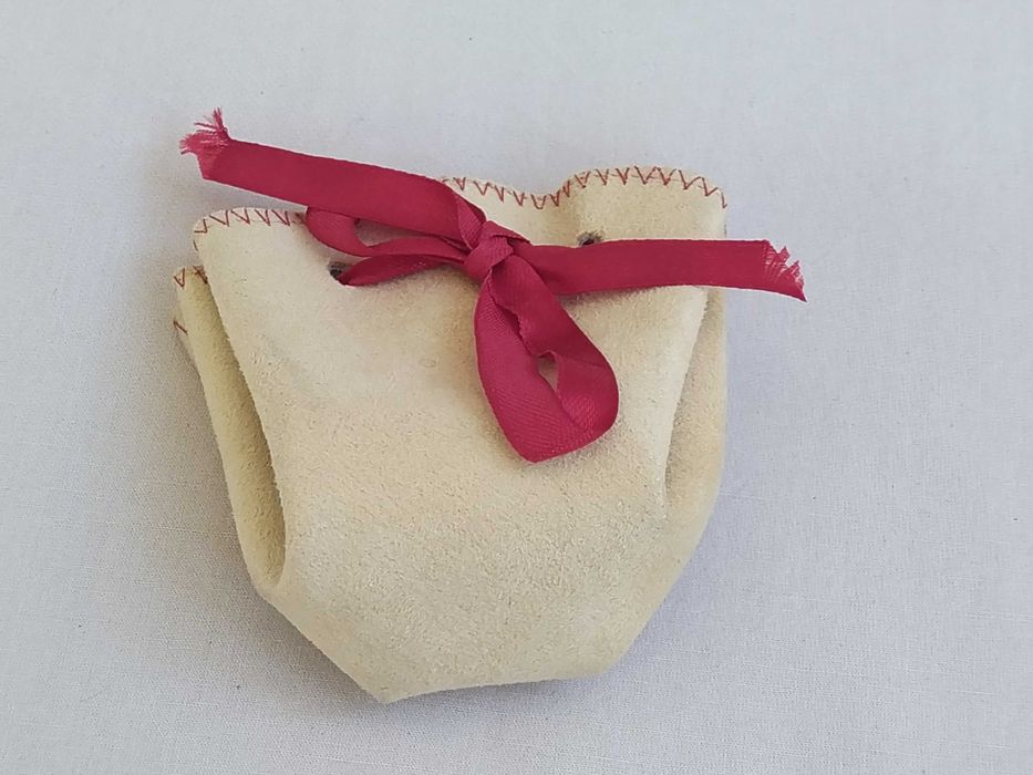Pequena bolsa de atilho